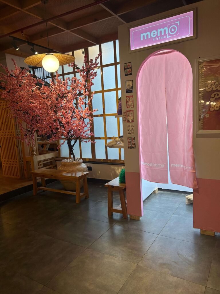 Pink Memo photobooth with cherry blossom tree at Kalsang Restaurant