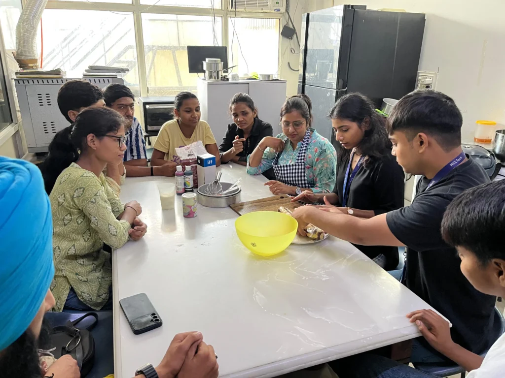 Students take part in a bakery training session at Noida Deaf Society in Noida.