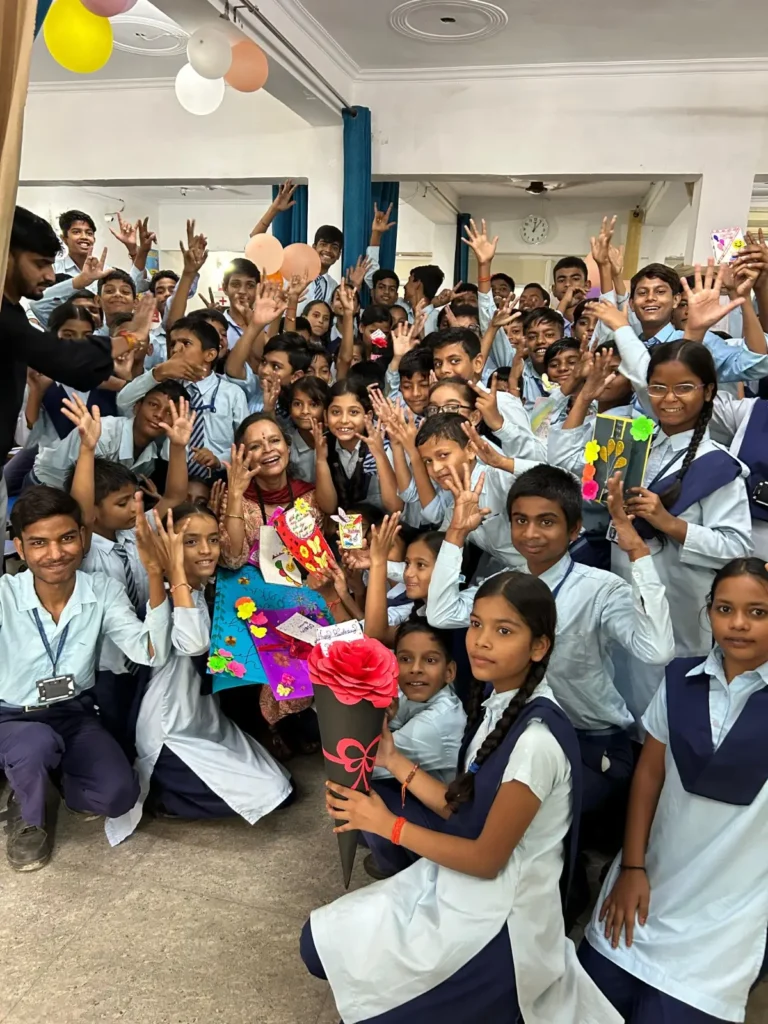 Noida Deaf Society founder Ruma Roka with students during a school interaction in Noida.