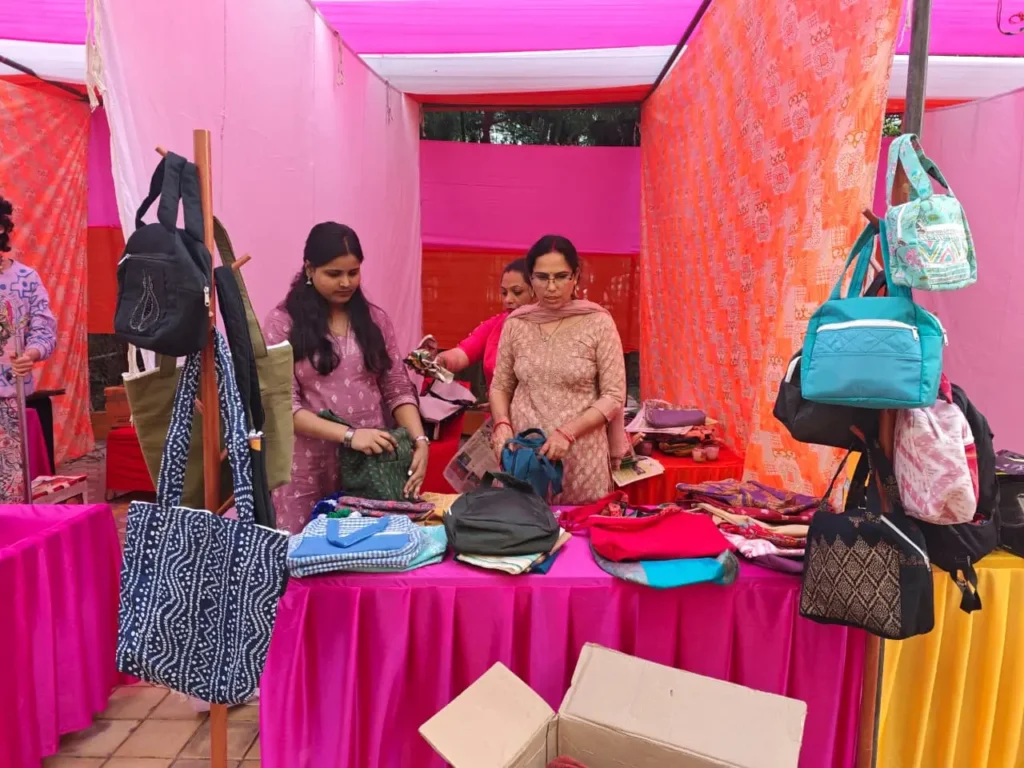 Eco-friendly stitched products made by women at SADRAG displayed at a Diwali Mela stall