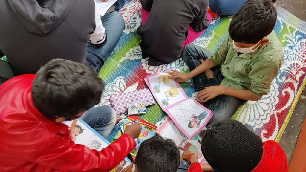 Children study together during a Pehchaan The Street School community learning session