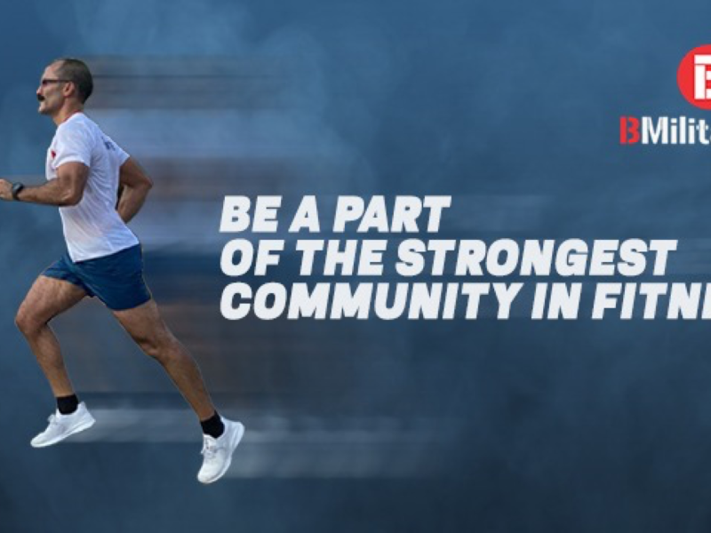 Runner in white T‑shirt on blue background with text “Be a part of the strongest community in fitness” and BMilitaryFit logo