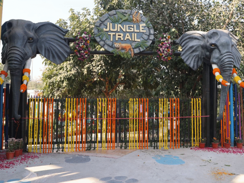 Entrance of Jungle Trail waste to wildlife park in Sector 94 Noida with decorative elephant gateways and colourful floral fencing