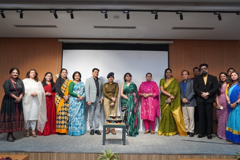 Women leaders and university officials during the Aarohini International Women’s Day celebration at Noida International University in Greater Noida