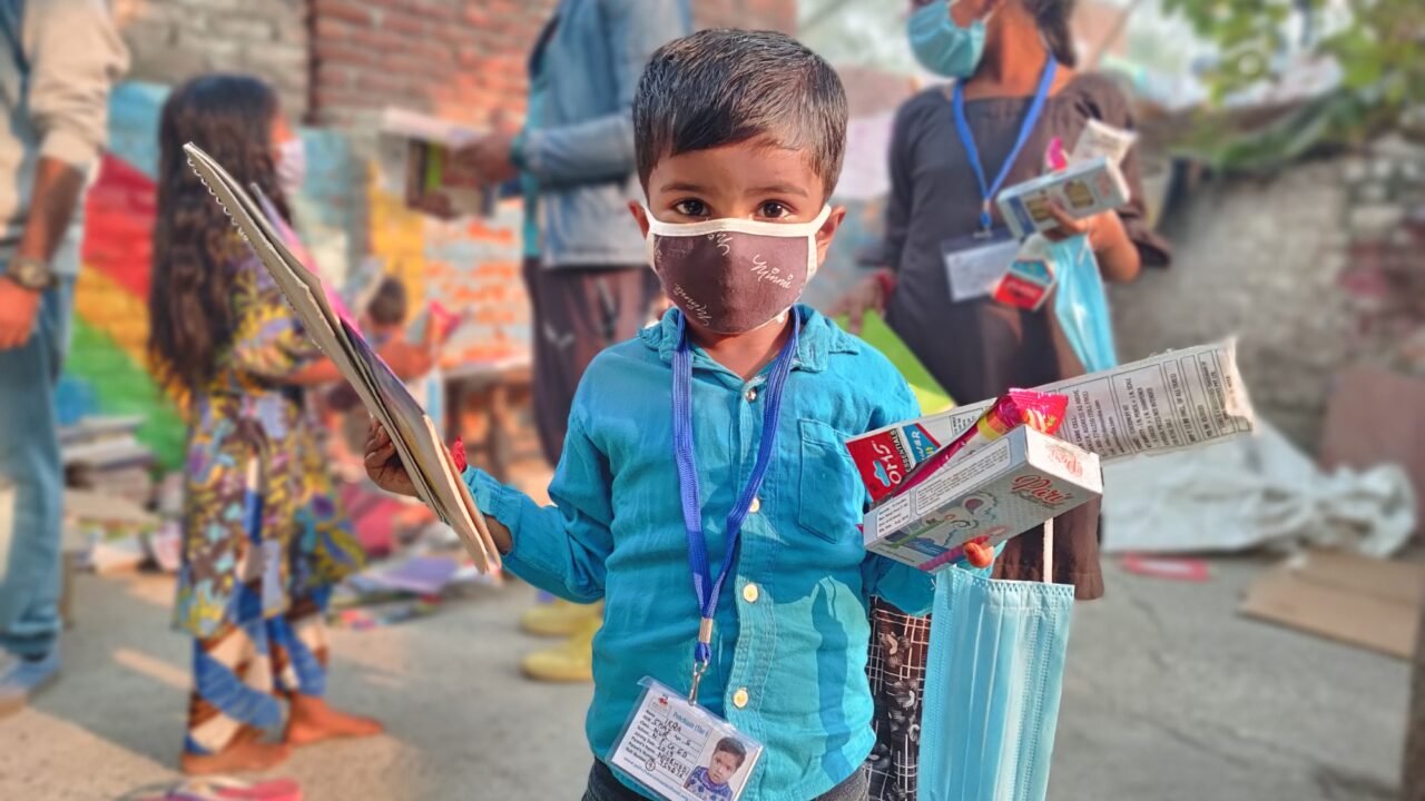 A young student smiling at Pehchaan The Street School in Noida Delhi NCR