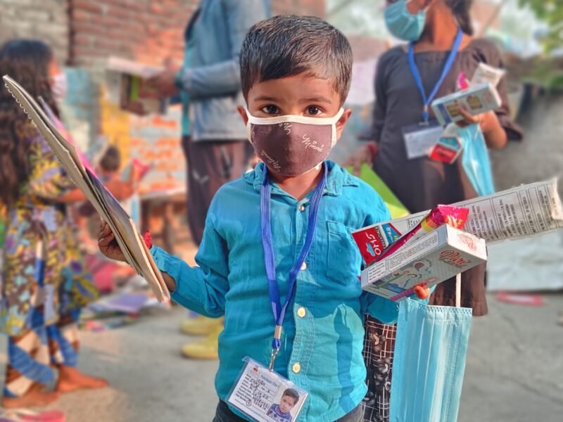 A young student smiling at Pehchaan The Street School in Noida Delhi NCR