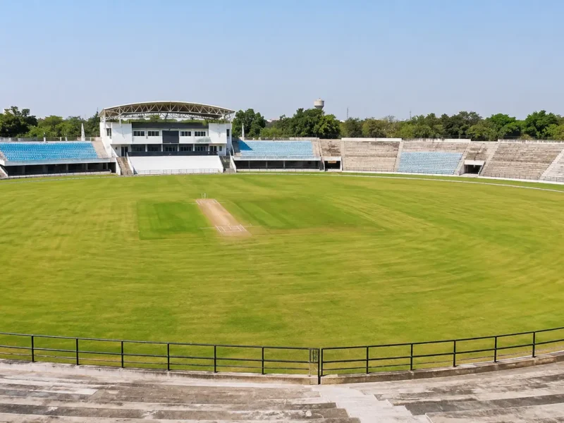 Empty cricket stadium with green outfield and concrete stands in Greater Noida, ahead of Big Cricket League matches starting June 3, 2026