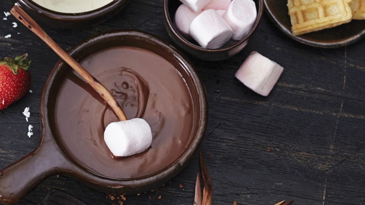 Chocolate dessert and marshmallows from Cafe Delhi Heights shown as a representational food image